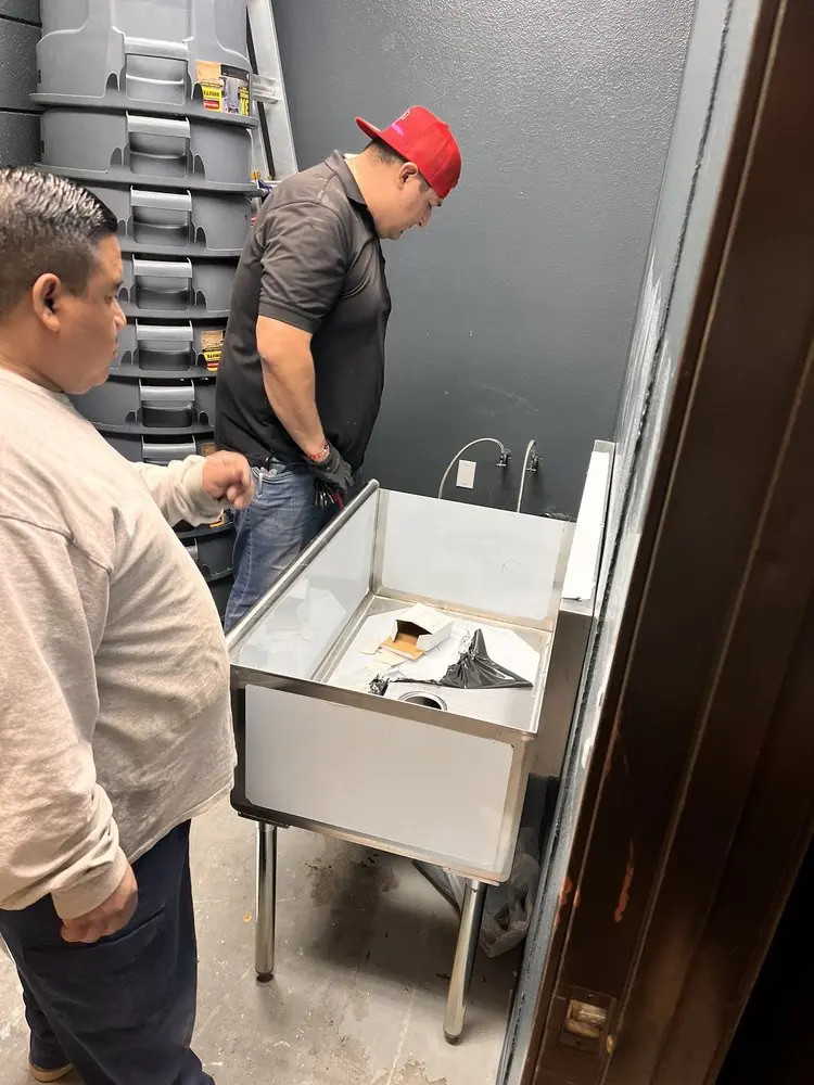 Commercial plumbing and sink installation in Landing